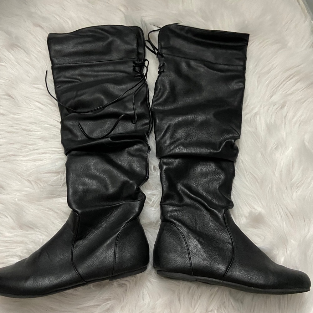Knee high boots.